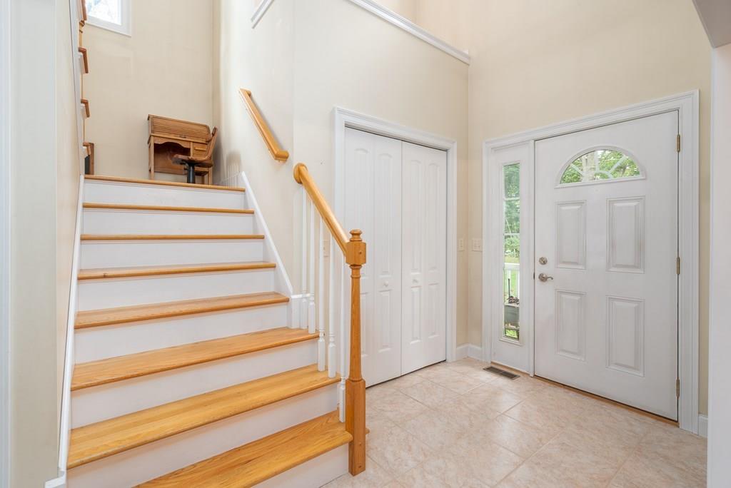 45 Gilbert Road Southampton, MA 01073 - Photo 14 of 36 a view of entryway with wooden floor and stairs