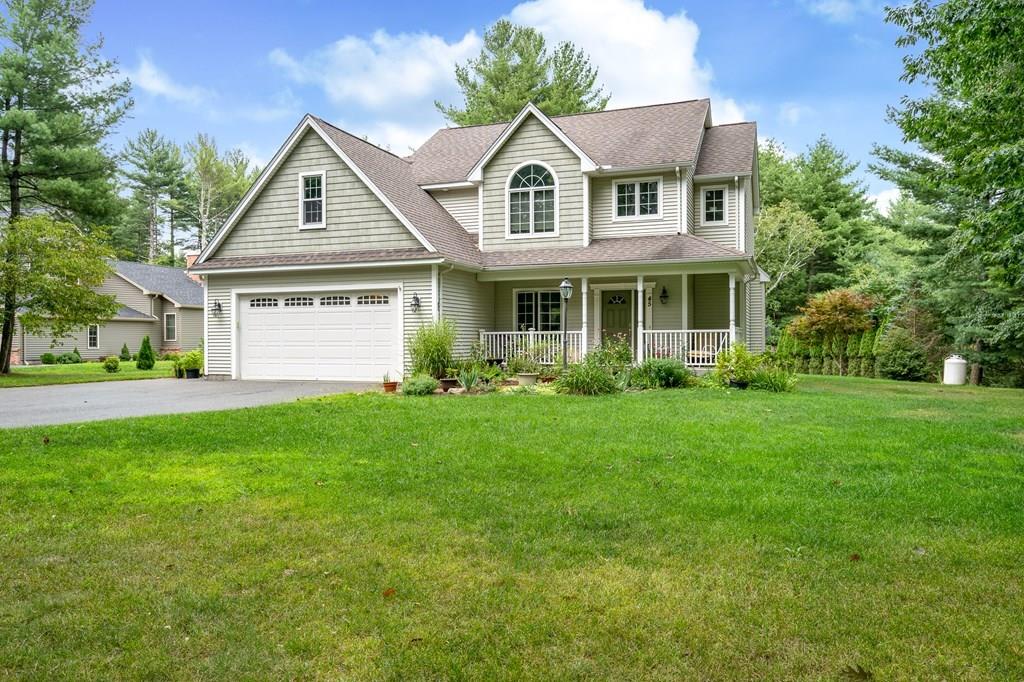 45 Gilbert Road Southampton, MA 01073 - Photo 2 of 36 a front view of a house with a yard and trees