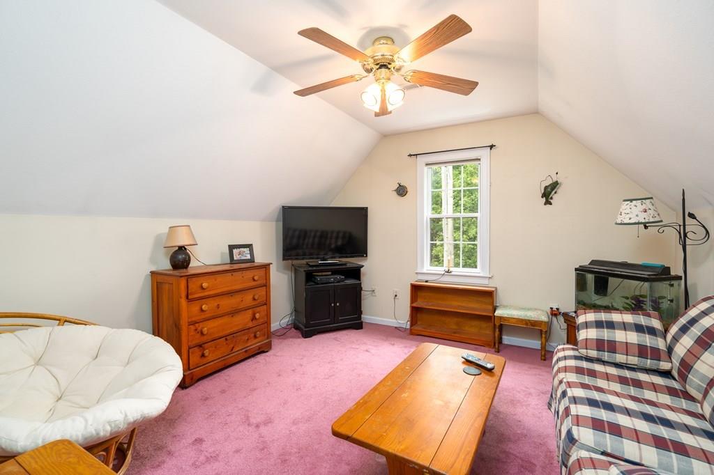 45 Gilbert Road Southampton, MA 01073 - Photo 23 of 36 a bedroom with furniture and a flat screen tv