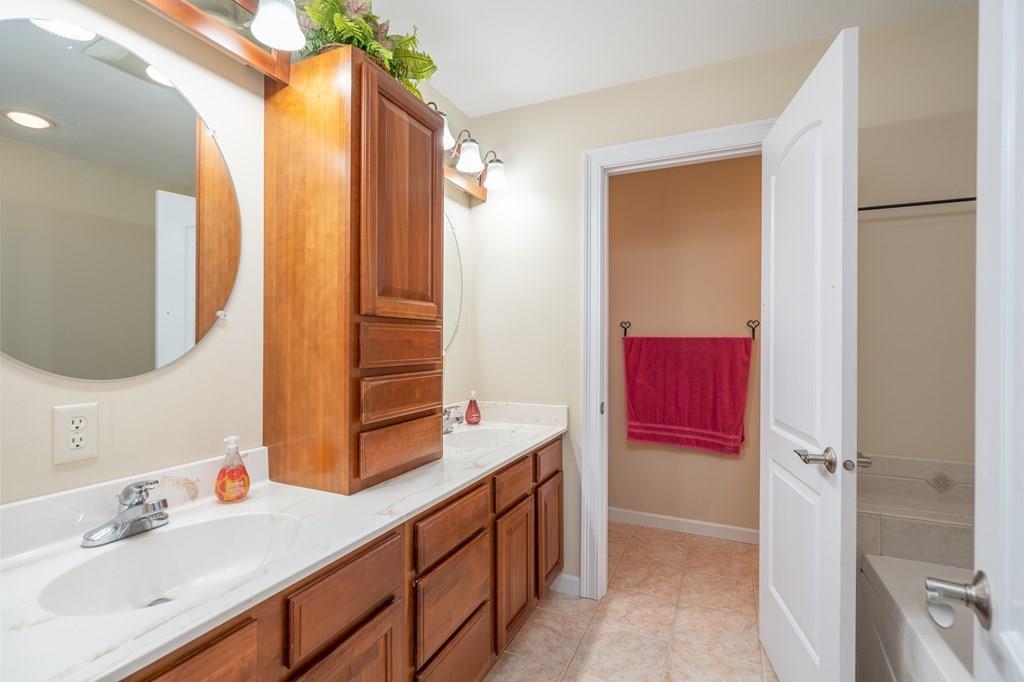 45 Gilbert Road Southampton, MA 01073 - Photo 25 of 36 a bathroom with a sink and a mirror