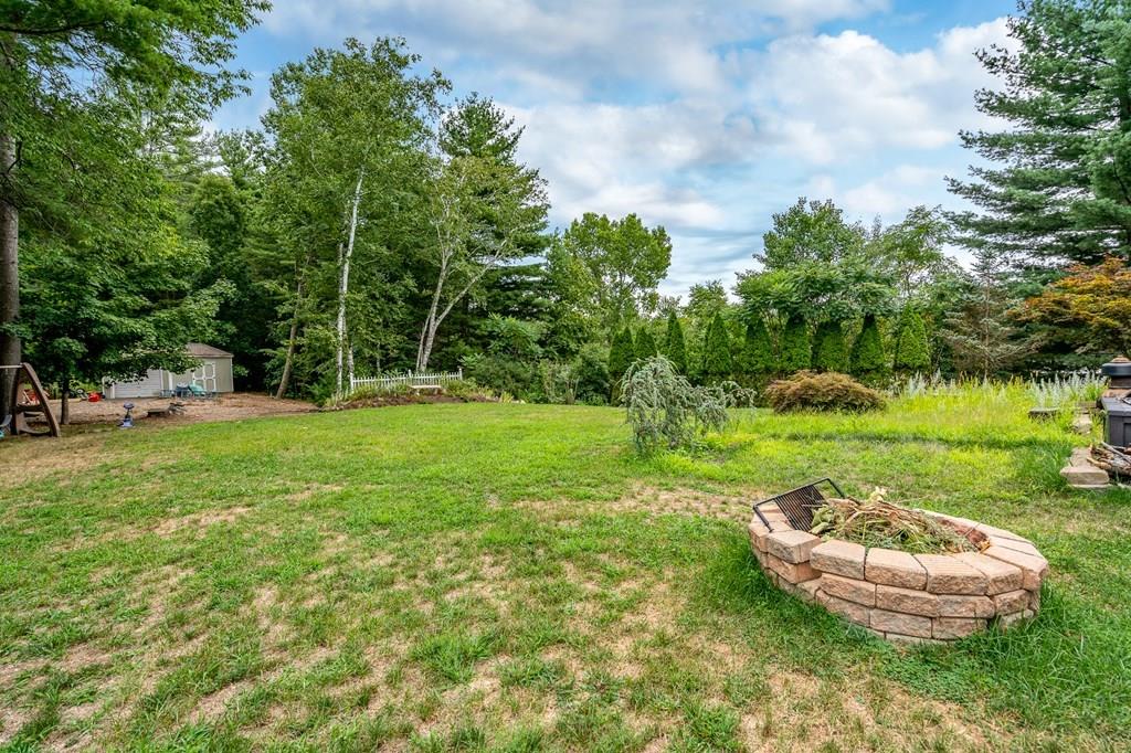 45 Gilbert Road Southampton, MA 01073 - Photo 31 of 36 a view of a table and chairs in the garden