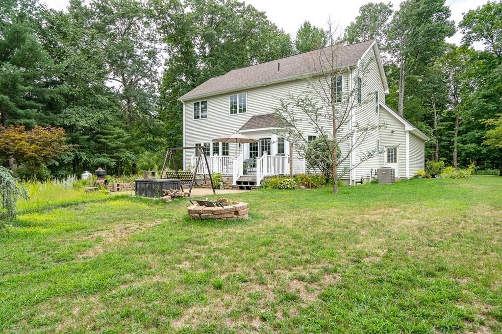 45 Gilbert Road Southampton, MA 01073 - Photo 34 of 36 a view of a house with backyard and sitting area