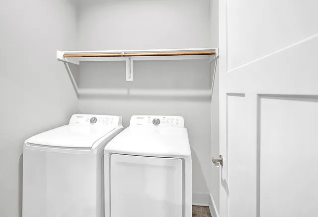 a utility room with dryer and washer