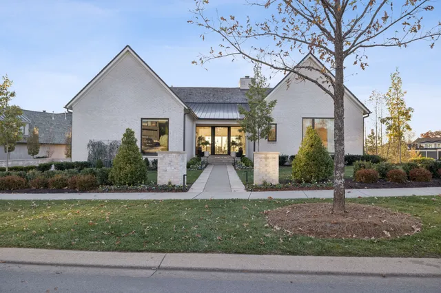 a view of a large building with a yard