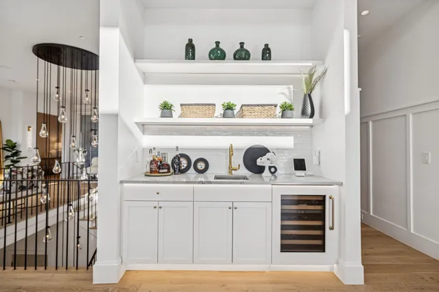 a view of a kitchen with washer and dryer
