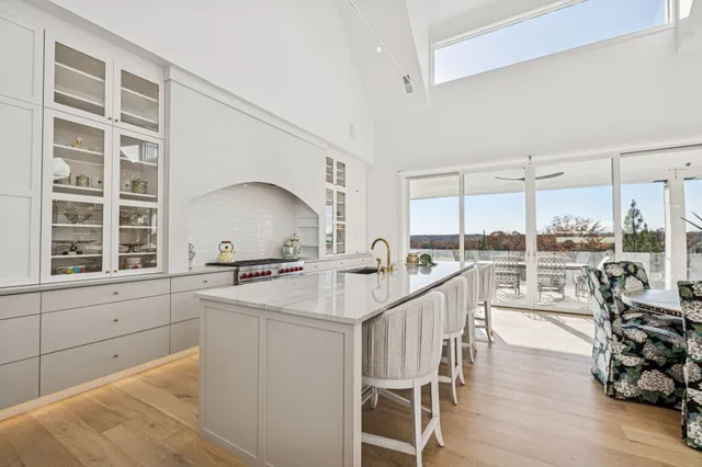 a bathroom with a toilet a sink and a mirror