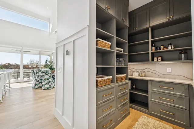 a bathroom with a glass shower door