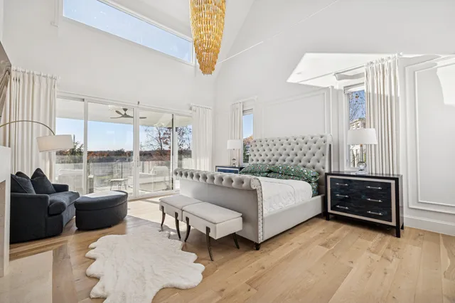 a bathroom with a shower sink double vanity and mirror