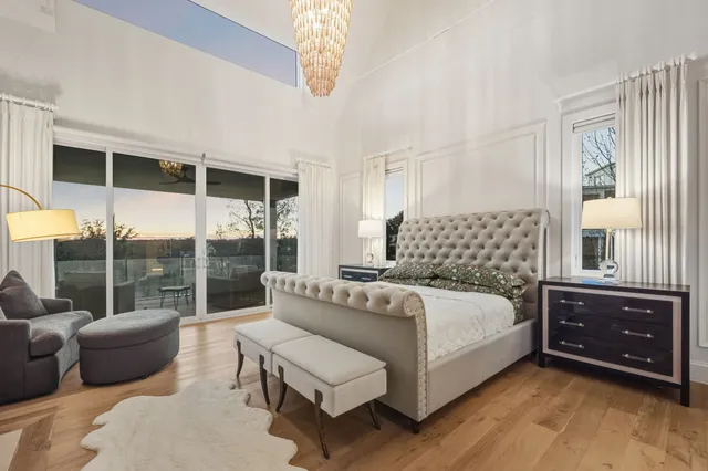 a front view of house with a garden