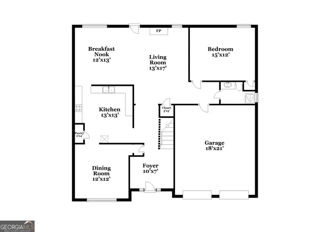 an empty room with wooden floor fireplace and windows