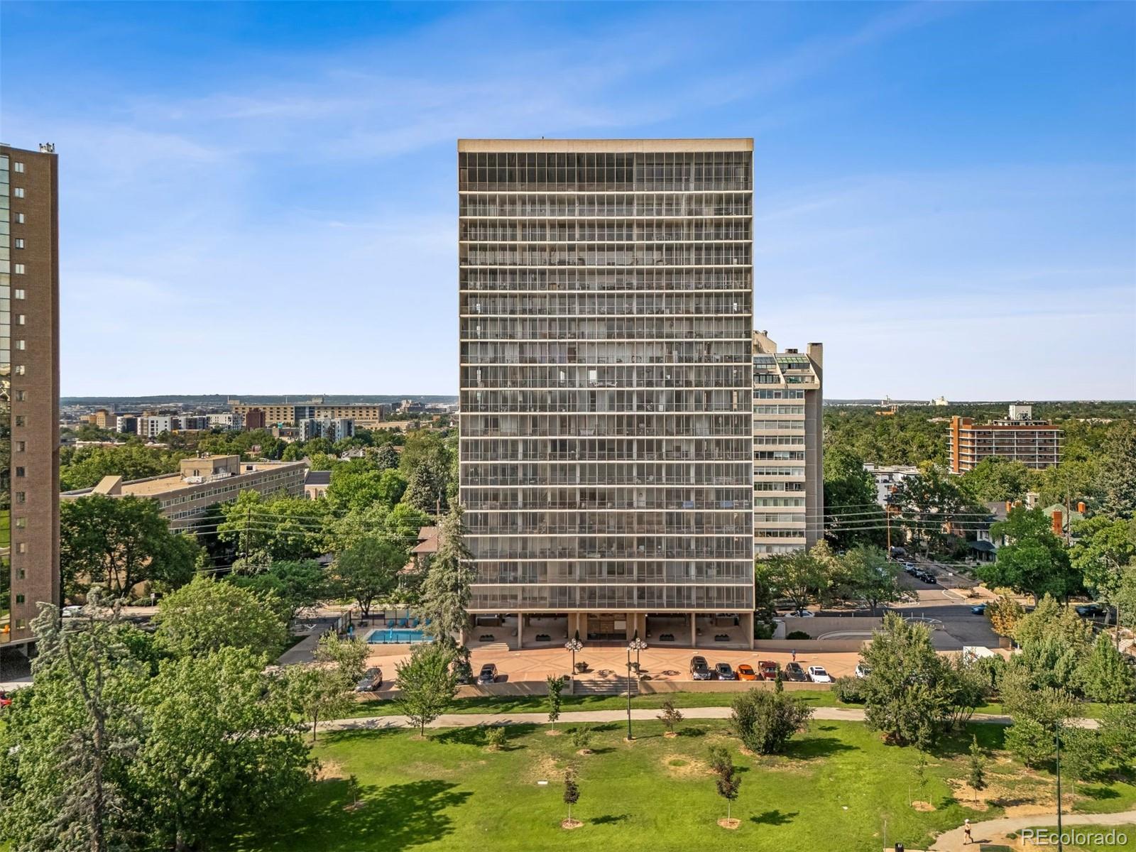 a view of house with a swimming pool
