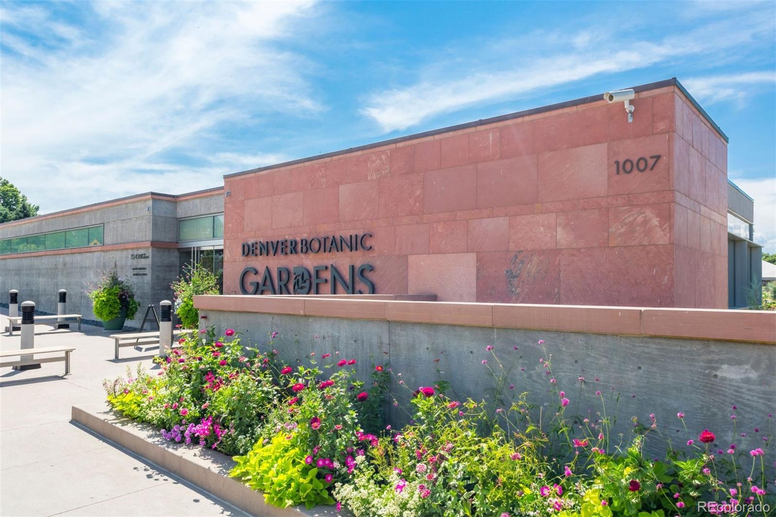 1201 North Williams Street, Unit 2A Denver, CO 80218 - Photo 24 of 29 a view of sign board with buildings in background