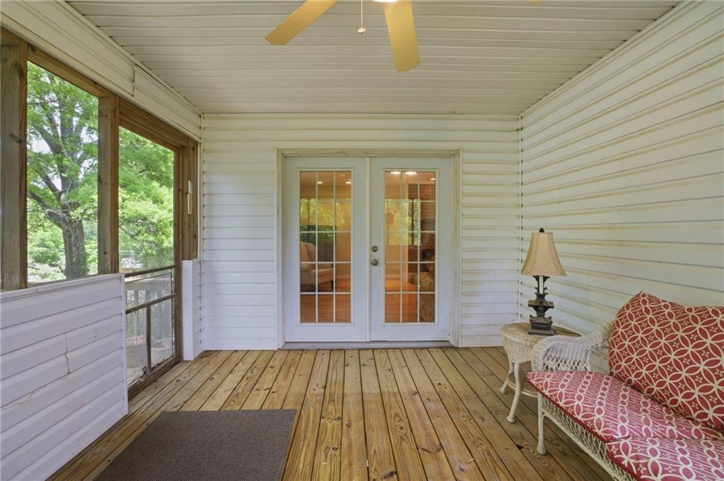 12 Whispering Pines Northeast Rome, GA 30161 - Photo 46 of 57 a bedroom with a bed and wooden floor