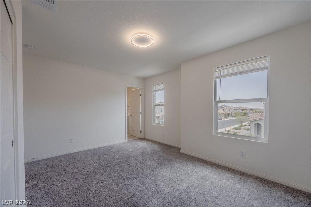 5927 Coja Street Las Vegas, NV 89113 - Photo 28 of 32 Unfurnished room with carpet and baseboards