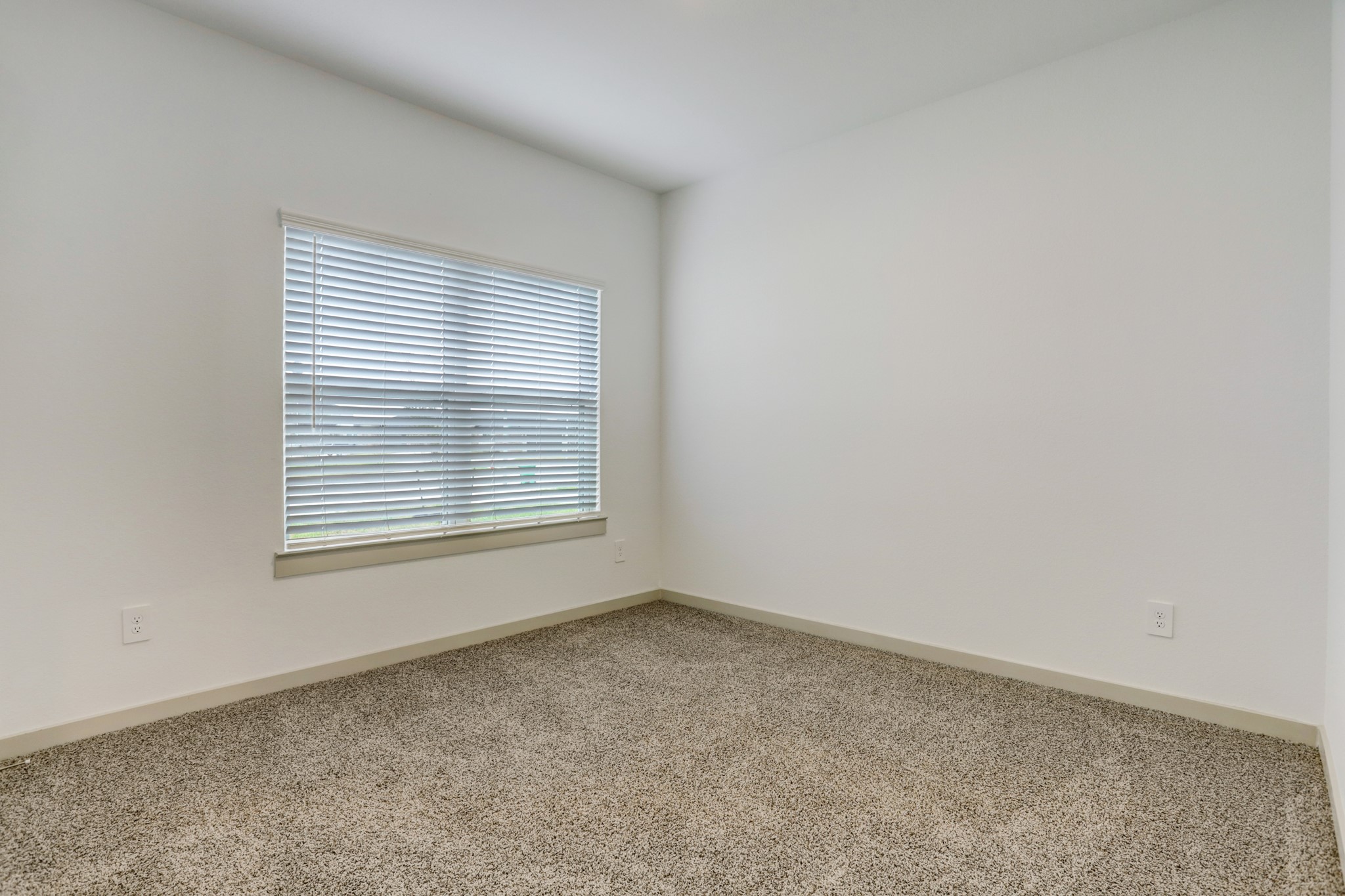 29866 Wildcat Way Katy, TX 77494 - Photo 11 of 25 an empty room with a window
