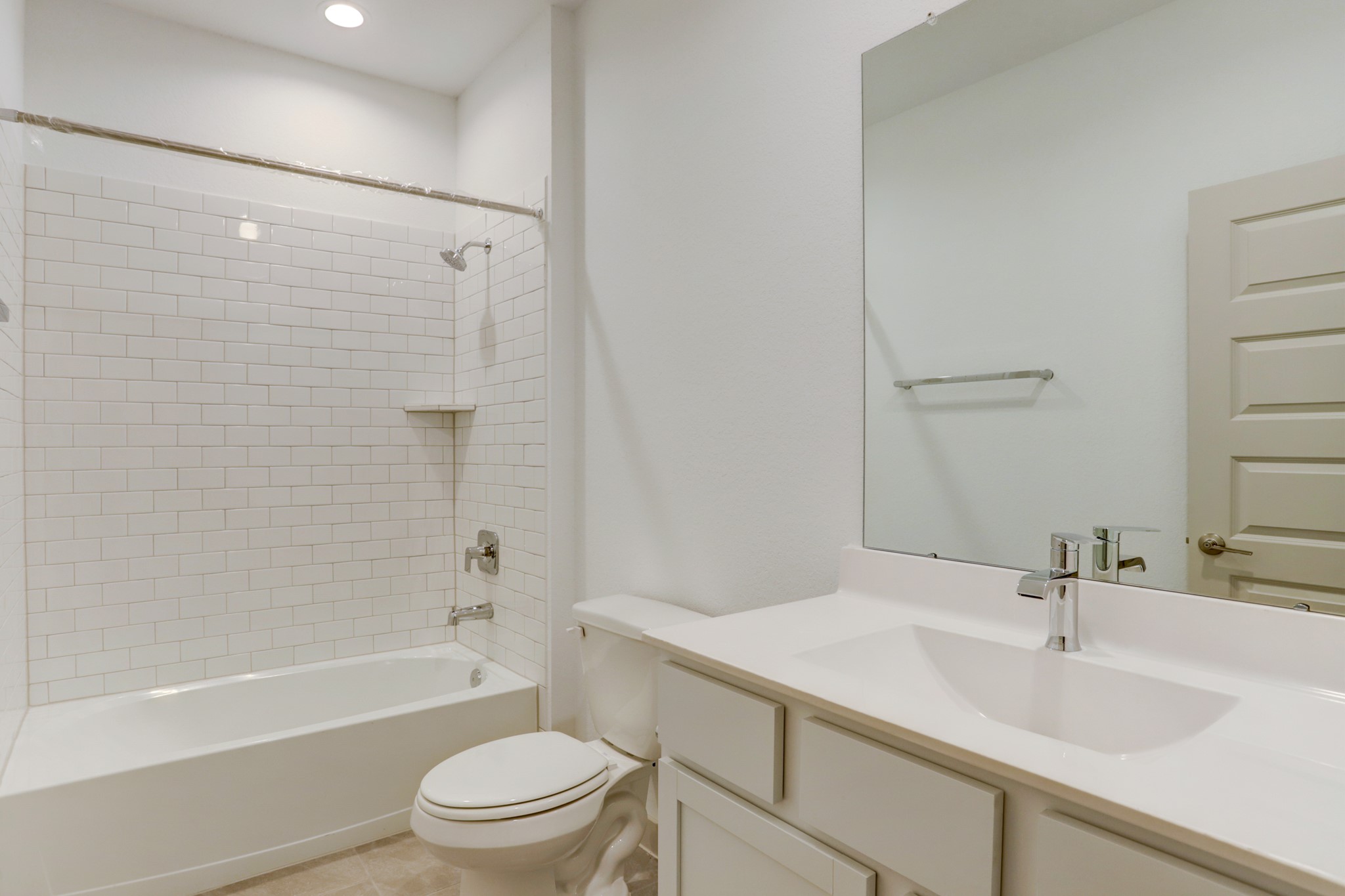 29866 Wildcat Way Katy, TX 77494 - Photo 12 of 25 a bathroom with a sink a toilet and a bathtub