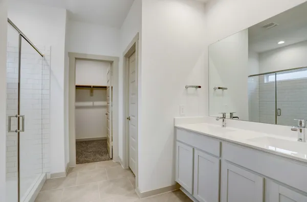 a bathroom with a sink and mirror