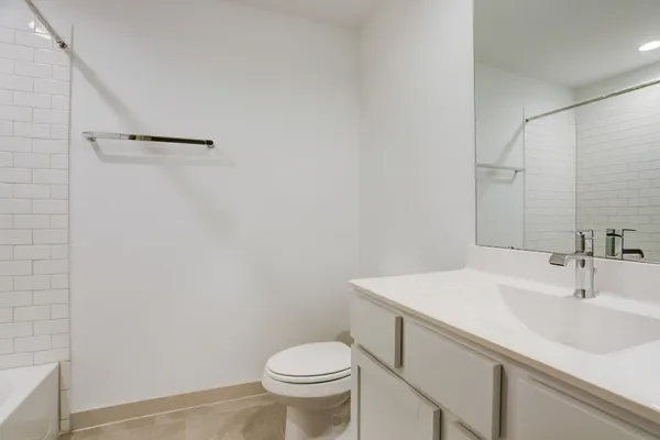 a bathroom with a sink and a toilet