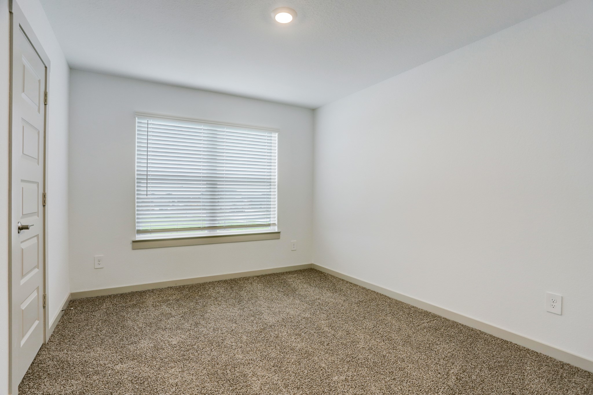 29866 Wildcat Way Katy, TX 77494 - Photo 20 of 25 an empty room with a window