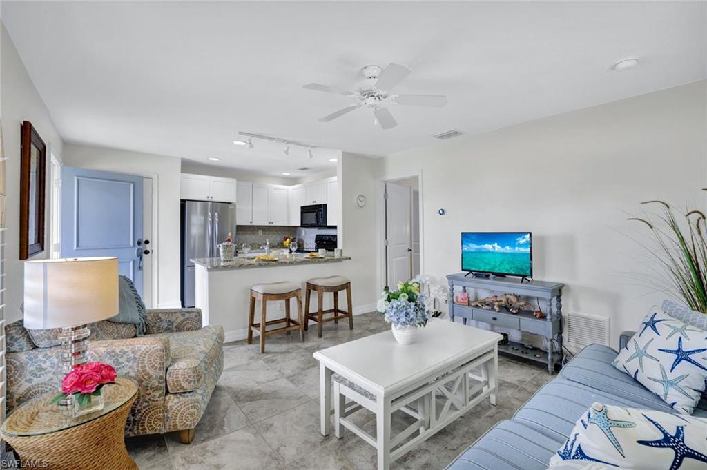 655 8th Avenue South, Unit 6 Naples, FL 34102 - Photo 1 of 20 Living Room and Kitchen