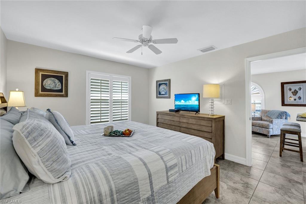 655 8th Avenue South, Unit 6 Naples, FL 34102 - Photo 14 of 20 Master Bedroom looking into living room