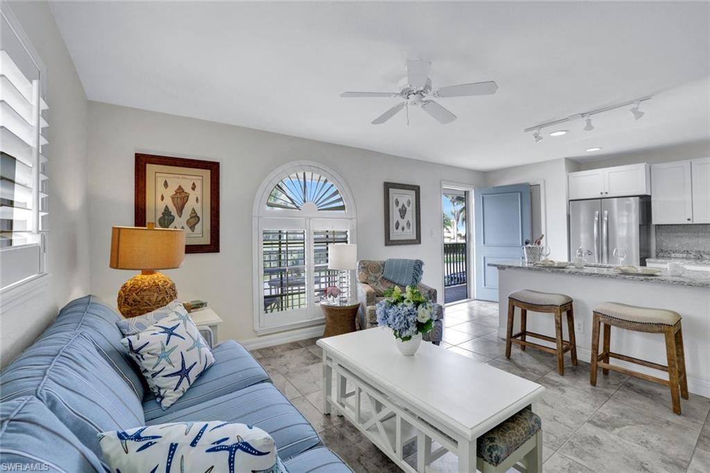 655 8th Avenue South, Unit 6 Naples, FL 34102 - Photo 7 of 20 Living Room and Kitchen