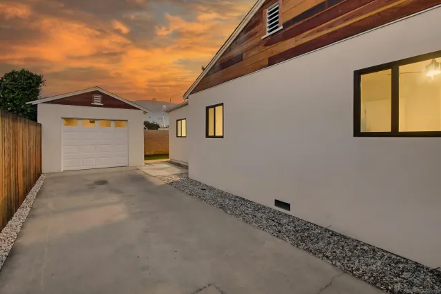 a backyard of a house with seating space
