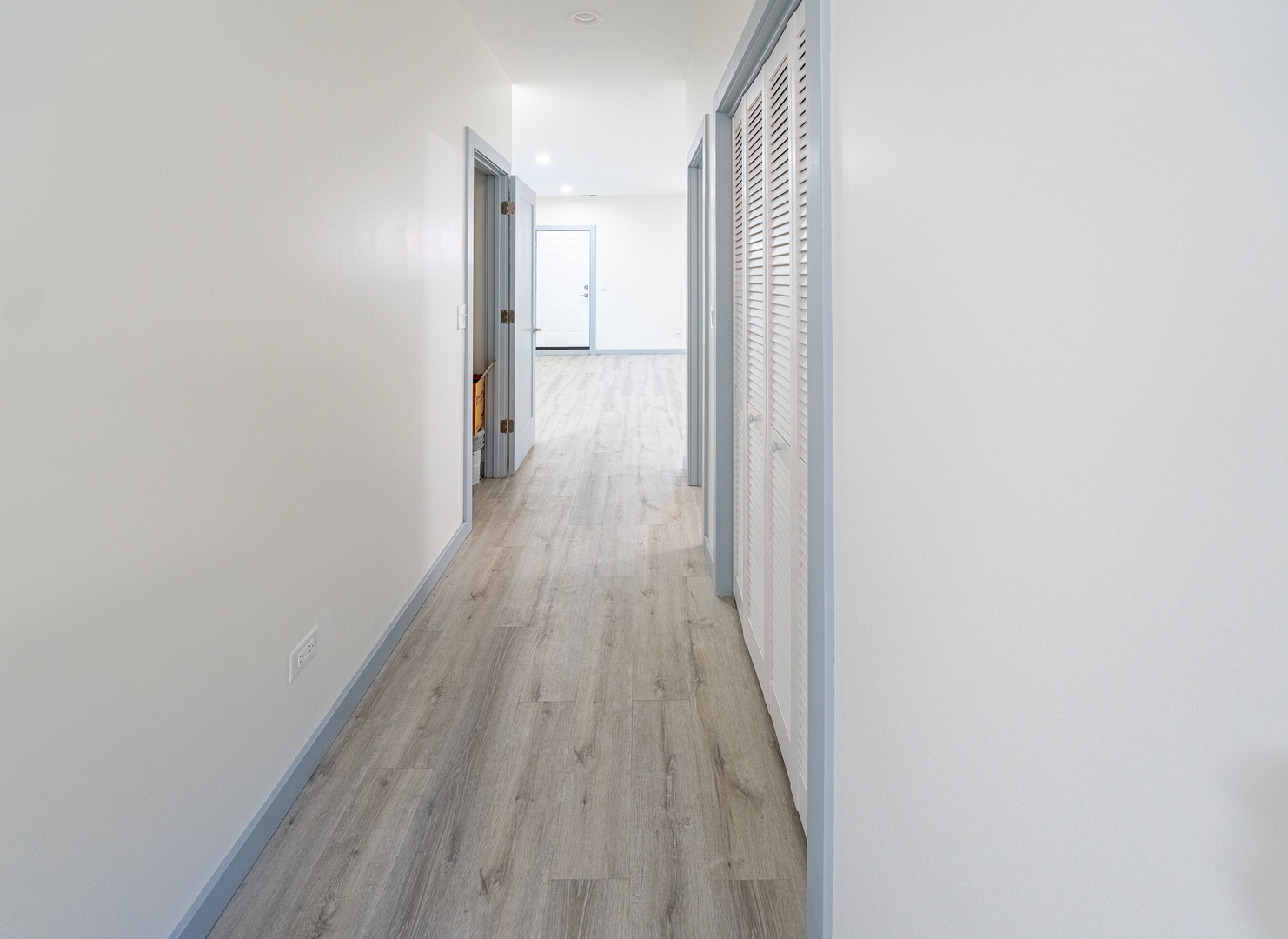 4353 South Halsted Street Chicago, IL 60609 - Photo 19 of 21 a view of a hallway with wooden floor