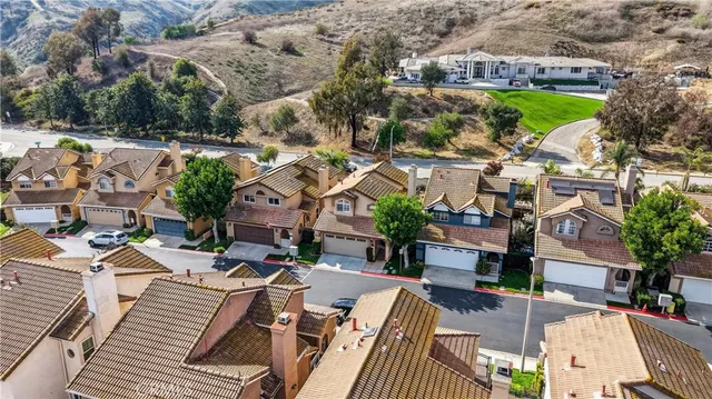 an aerial view of a house with a garden