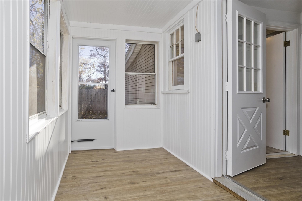 53 Champlain Street Springfield, MA 01151 - Photo 28 of 30 a view of a hallway with wooden floor and entryway