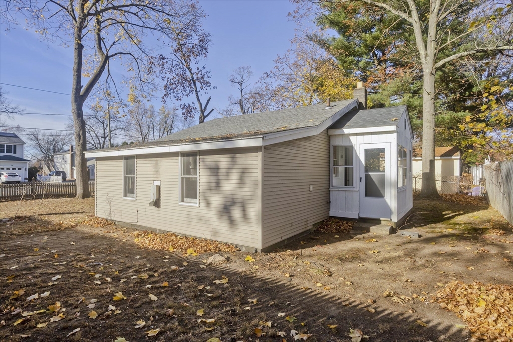 53 Champlain Street Springfield, MA 01151 - Photo 29 of 30 a view of a house with a yard