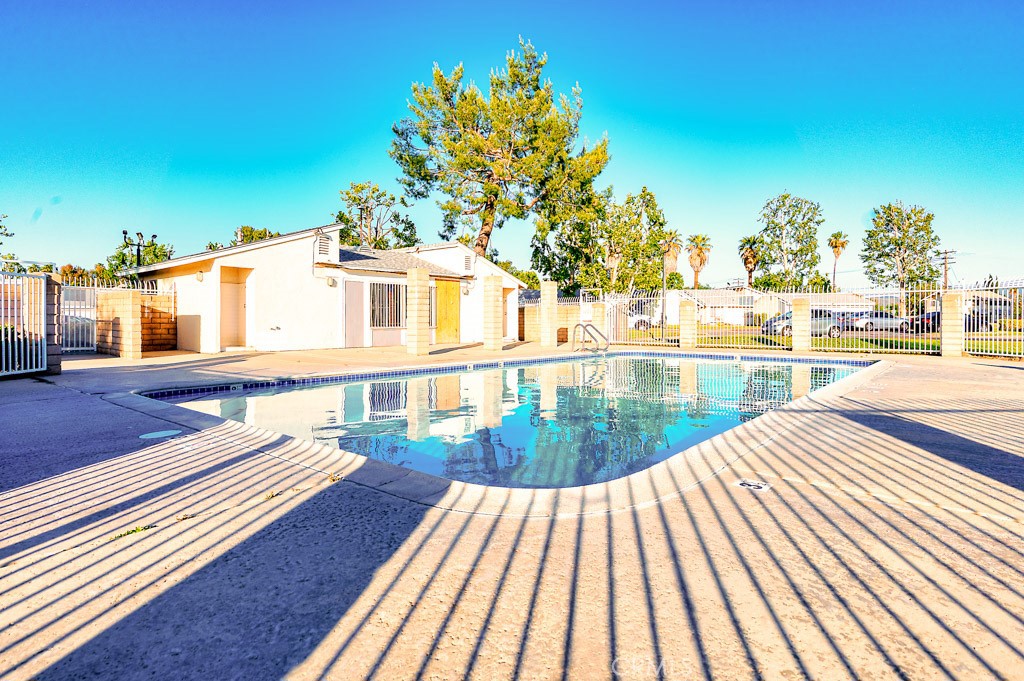 25899 Baylor Way Hemet, CA 92544 - Photo 27 of 29 a view of swimming pool with outdoor seating and plants