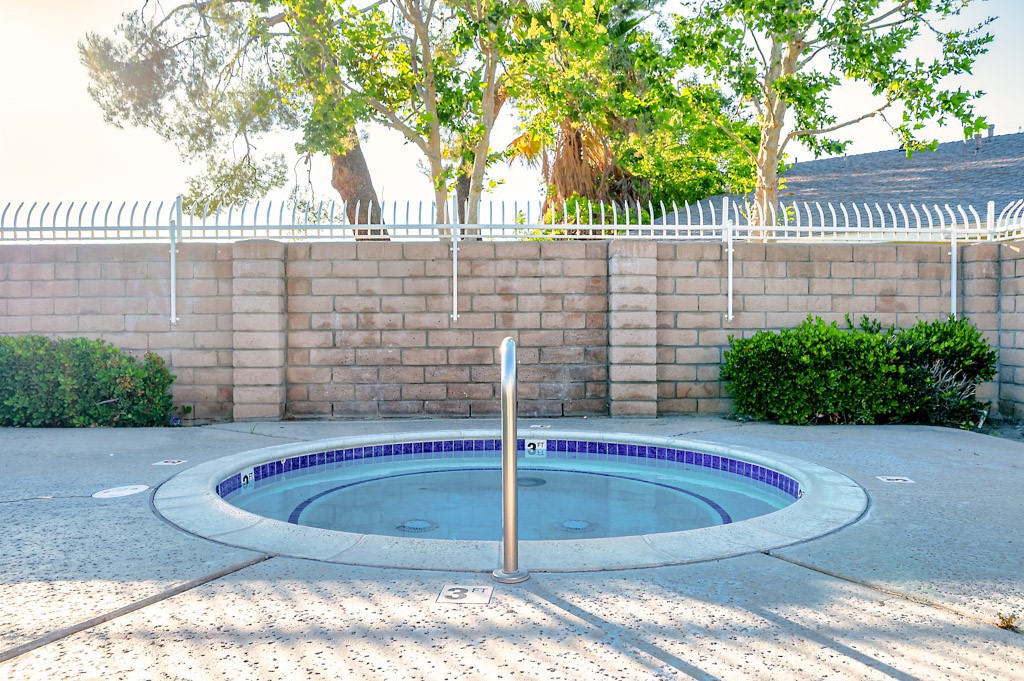 25899 Baylor Way Hemet, CA 92544 - Photo 28 of 29 a view of a swimming pool with a backyard