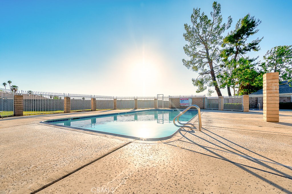 25899 Baylor Way Hemet, CA 92544 - Photo 29 of 29 a view of a swimming pool with a lounge chair