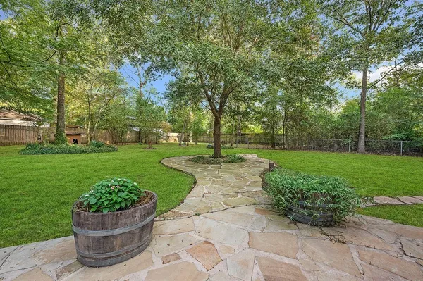 a view of a garden with a fountain