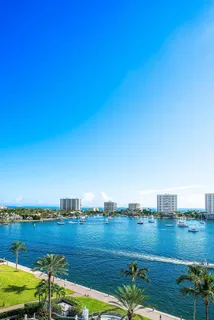 a view of a chair and tables front of the house