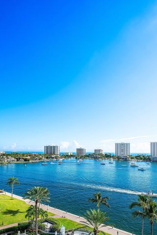 a view of a chair and tables front of the house