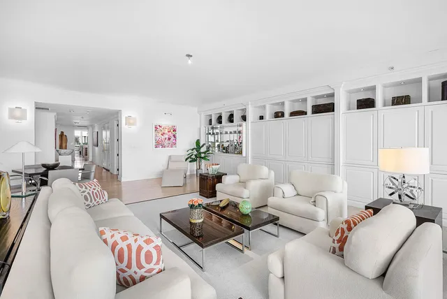 a living room with furniture and a couch