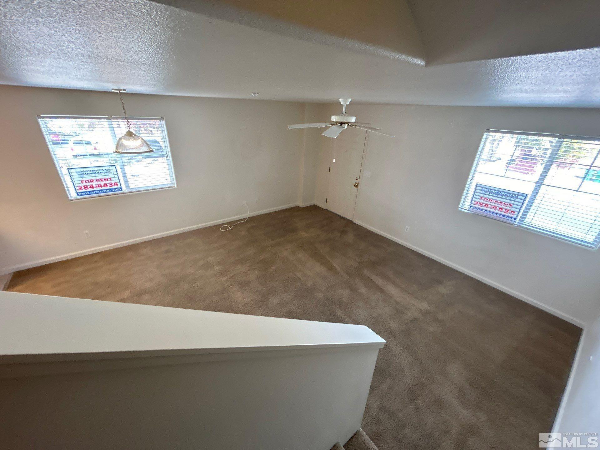 405 Holcomb Avenue Reno, NV 89502 - Photo 15 of 17 an empty room with windows