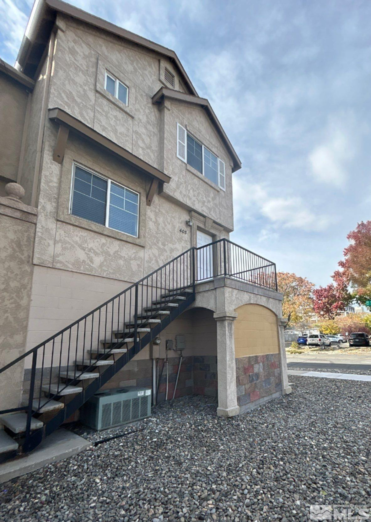 405 Holcomb Avenue Reno, NV 89502 - Photo 7 of 17 a view of a house with a yard
