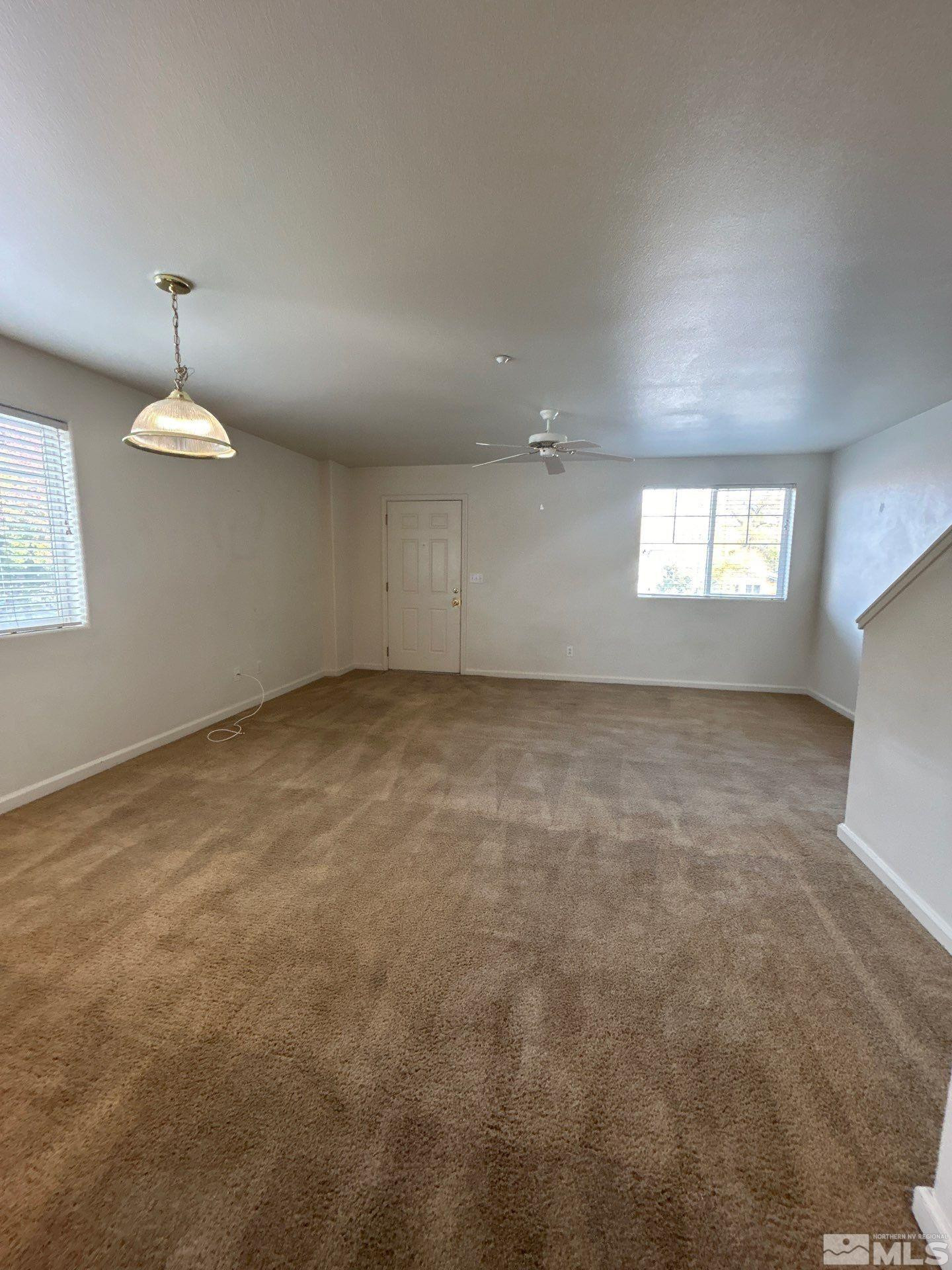 405 Holcomb Avenue Reno, NV 89502 - Photo 10 of 17 an empty room with a empty space and a window