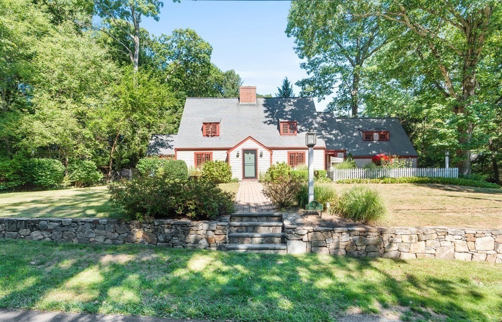 41 Sawyer Road Wellesley, MA 02481 - Photo 1 of 28 a front view of a house with garden