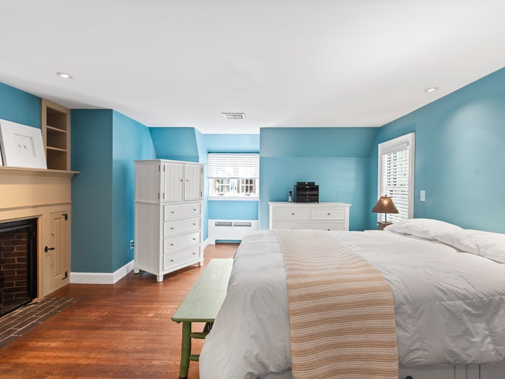 41 Sawyer Road Wellesley, MA 02481 - Photo 12 of 28 a large bedroom with a bed and a flat screen tv