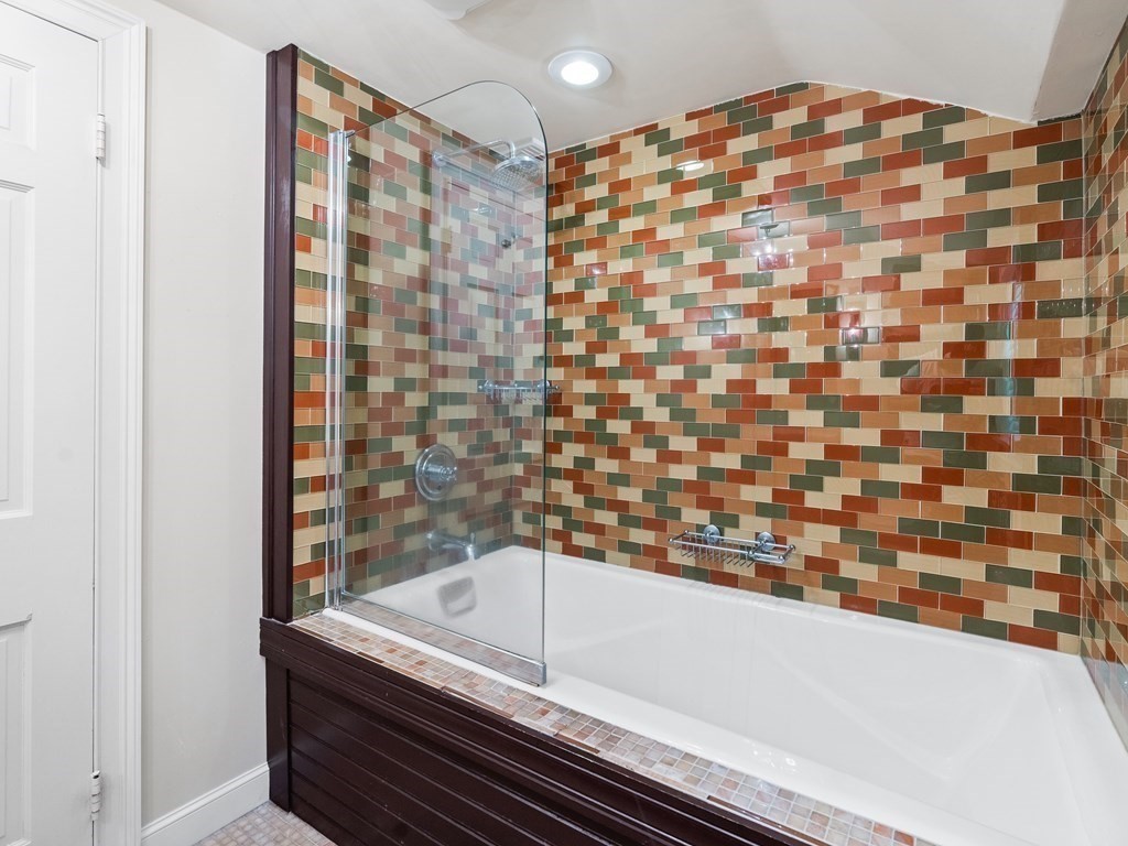 41 Sawyer Road Wellesley, MA 02481 - Photo 15 of 28 a bathroom with a bathtub and shower
