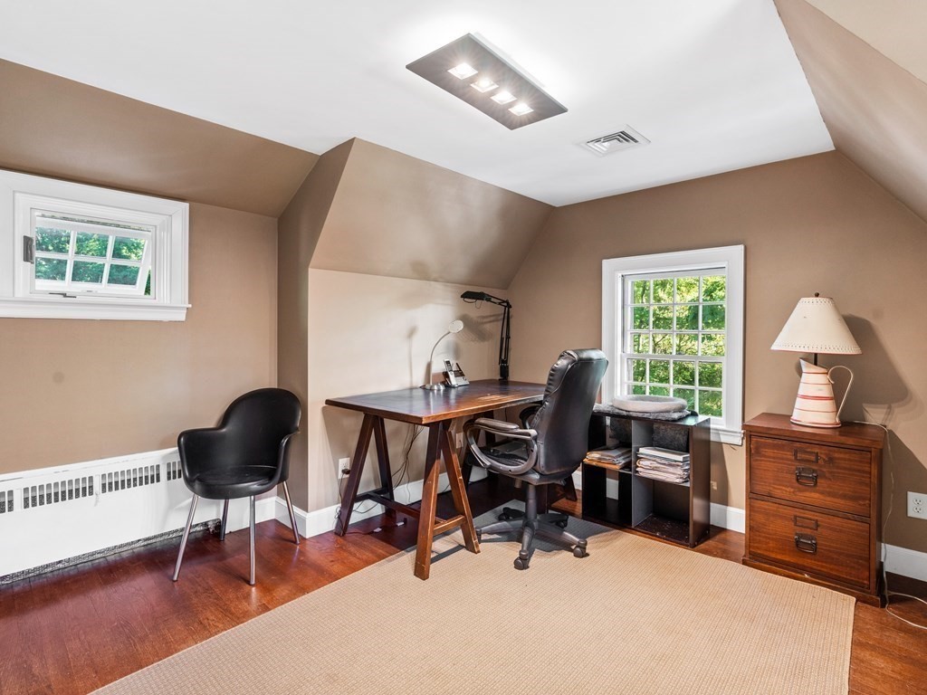 41 Sawyer Road Wellesley, MA 02481 - Photo 19 of 28 a workspace with furniture and a window