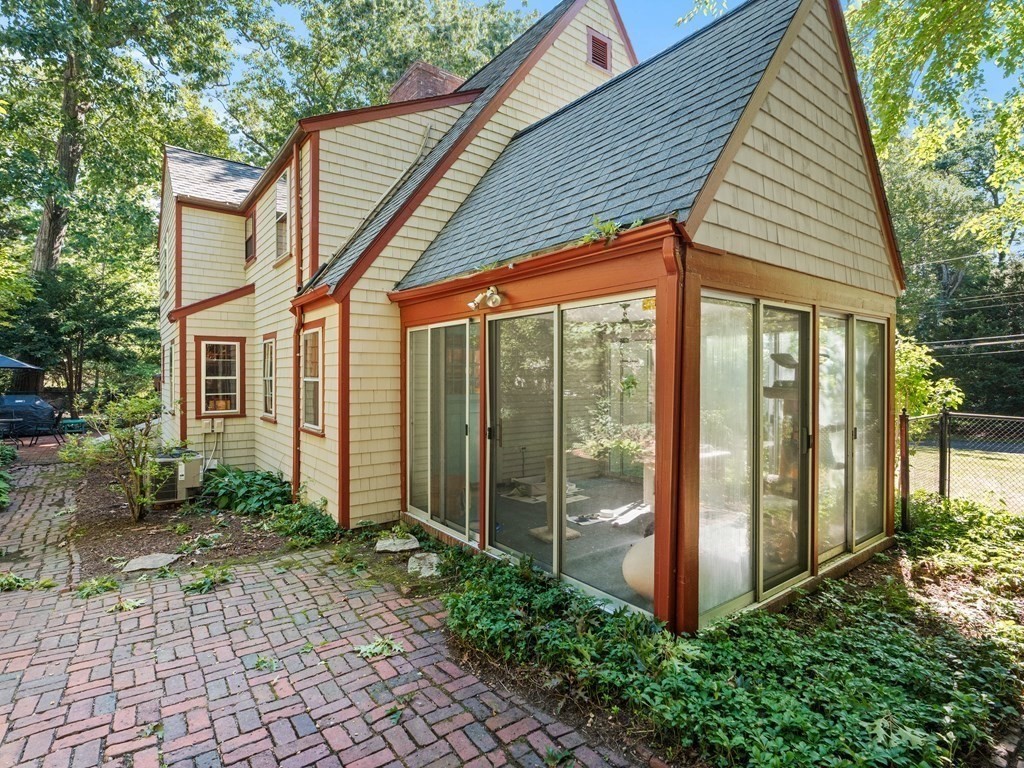 41 Sawyer Road Wellesley, MA 02481 - Photo 26 of 28 a front view of a house with a yard