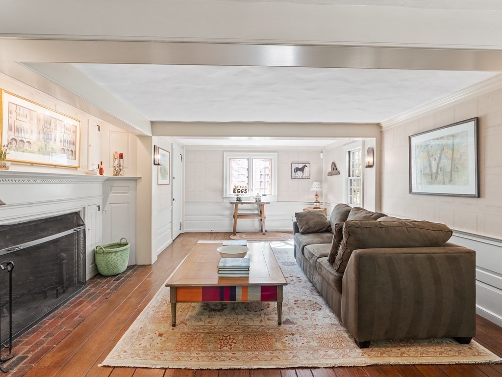 41 Sawyer Road Wellesley, MA 02481 - Photo 5 of 28 a living room with furniture and a fireplace