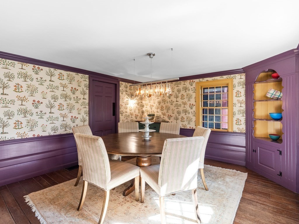 41 Sawyer Road Wellesley, MA 02481 - Photo 9 of 28 a view of a dining room with furniture large windows and wooden floor