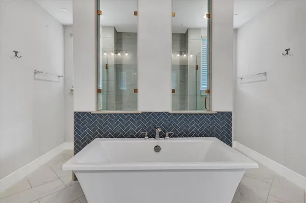 a bathroom with a bathtub