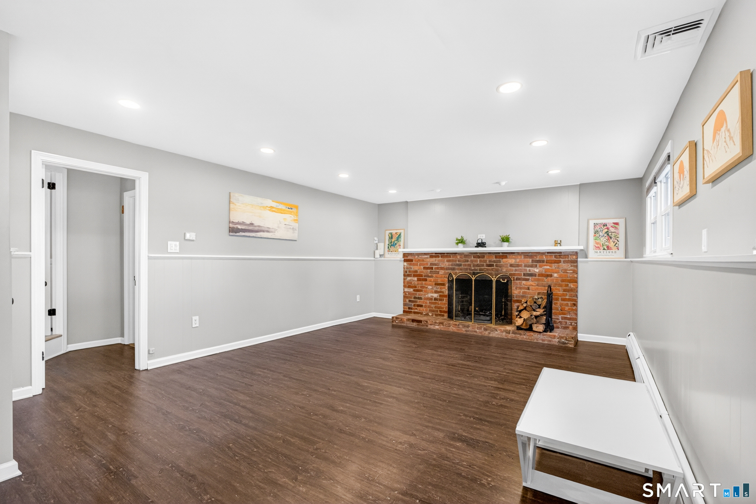 568 Wiese Road Cheshire, CT 06410 - Photo 15 of 40 an entryway with livingroom and fireplace
